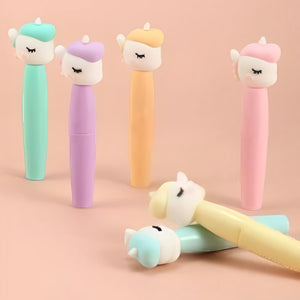 Three clear pouches, each containing a set of five pastel-colored unicorn-shaped mini highlighters, perfect for kids' school supplies.available at uSmile.toys www.usmile.toys