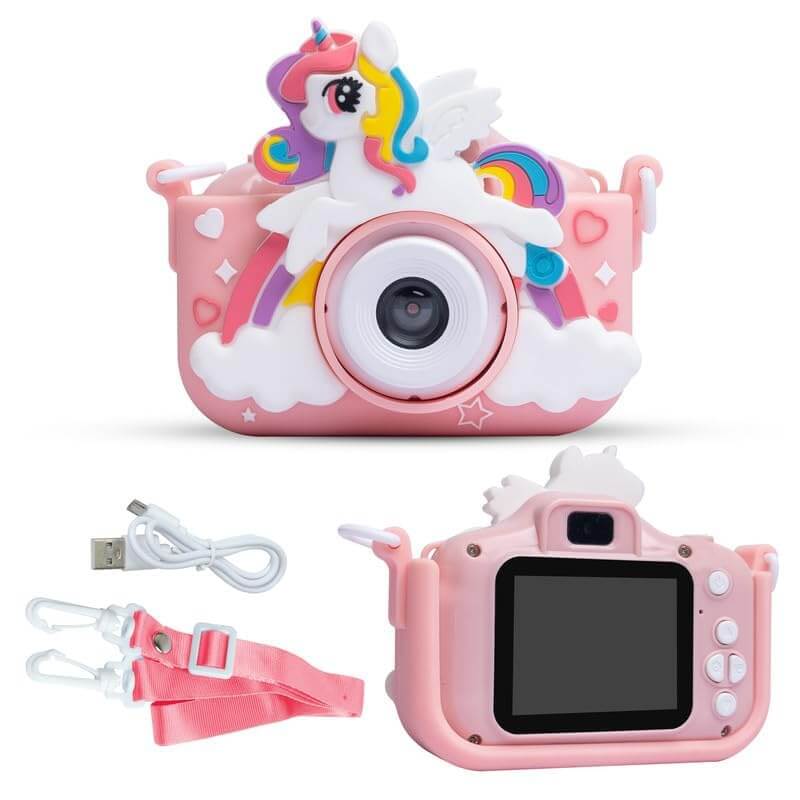 Cute pink kids' digital camera featuring a 1080P HD lens and a playful unicorn design with rainbow and clouds, shown with its included neck strap and USB charging cable. www.usmile.toys