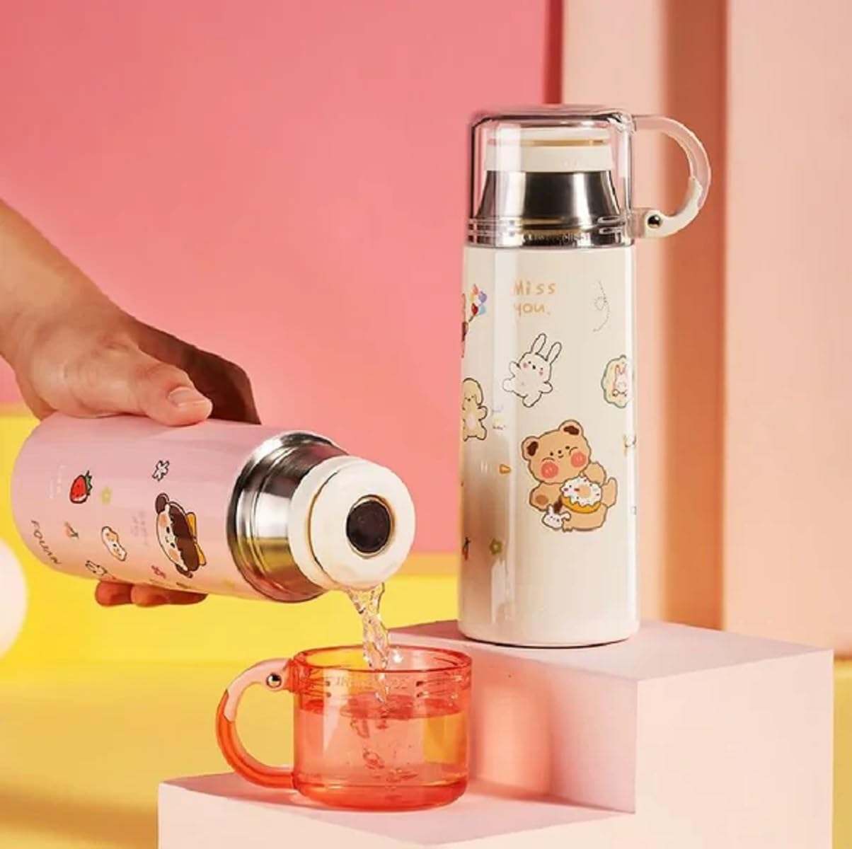 Insulated Stainless Steel Water Bottle with Cup Lid: Keeps drinks hot or cold for hours. Portable thermos.
www.usmile.toys