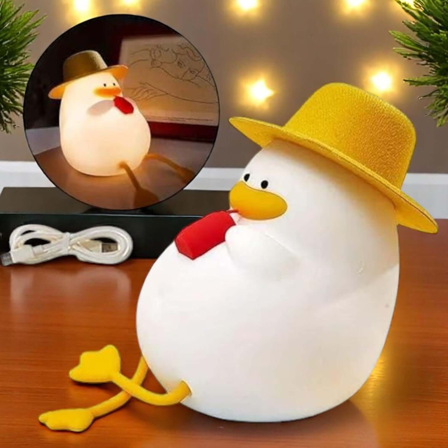 Adorable white silicone duck night lamp wearing a yellow hat and holding a red straw, glowing softly. The top-left inset shows the duck lamp illuminated in a dark room. This charming LED light is perfect for kids' rooms, nurseries, or as a unique gift, providing comforting ambient light.www.usmile.com