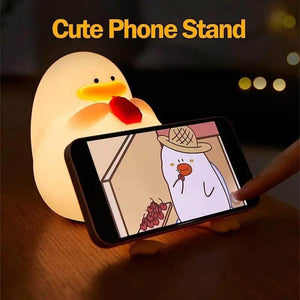 Cute duck night light with a hat, offering a warm and gentle glow for children's bedrooms. This soft-touch, rechargeable silicone lamp creates a cozy atmosphere, helping kids feel safe at night. www.usmile.com