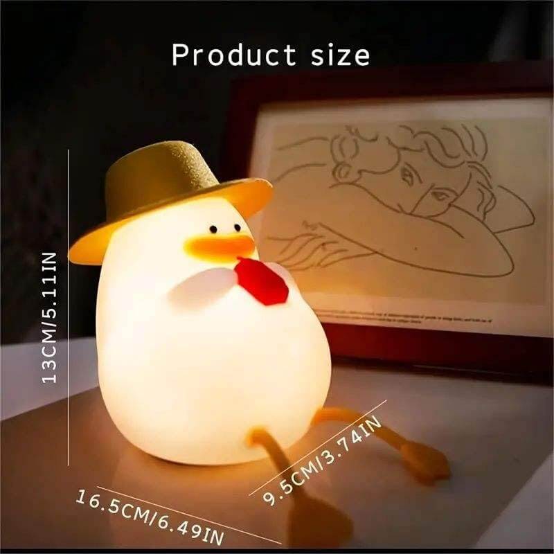 Cute duck night light with a hat, offering a warm and gentle glow for children's bedrooms. This soft-touch, rechargeable silicone lamp creates a cozy atmosphere, helping kids feel safe at night.www.usmile.com