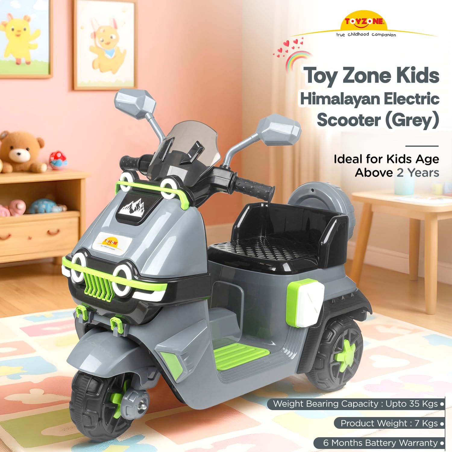 Toy Zone Kids Himalayan Electric Scooter in gray with green accents on a colorful rug. Electric Bike for Kids | Electric Ride-On Scooter for Kids 1 to 6 Years www.usmile.toys 