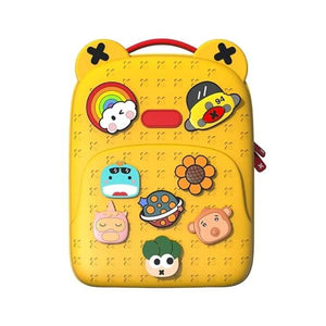 Front view of a fun, customizable silicone waterproof school bag for children, featuring a vibrant yellow color and various playful detachable badges like a rainbow, sun, and animals, ideal for kindergarten or primary school students from Usmile Toys.www.usmile.toys