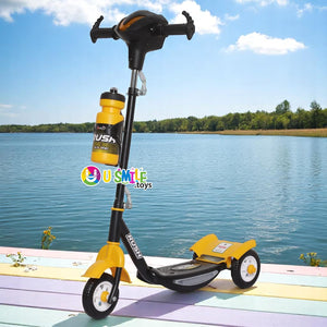 Black Fun Ride Kids Kick Scooter Rush DX with a water bottle holder, lights on wheels, and U Smile Toys branding on a grassy field www.usmile.com