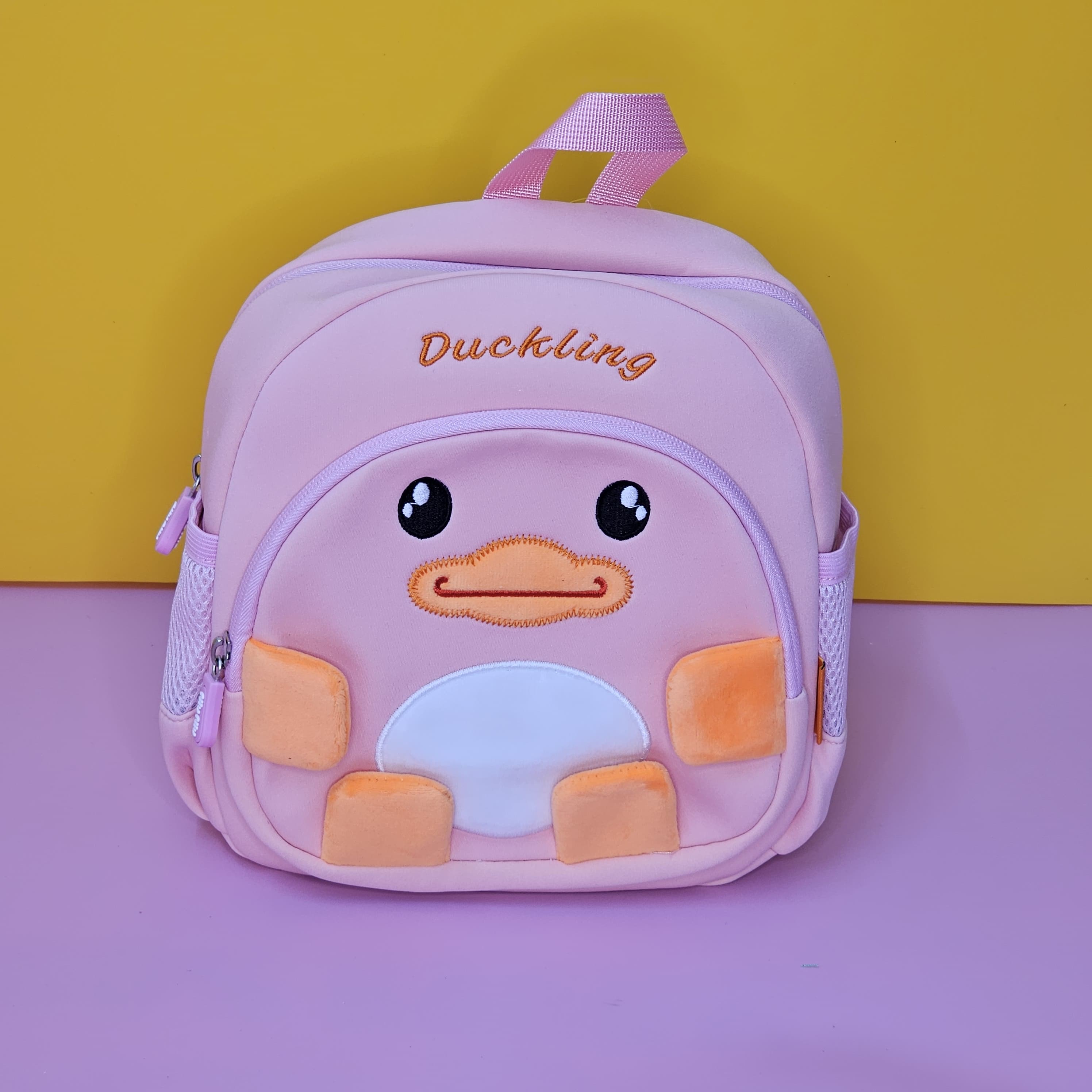 Buy cute duckling backpacks for children, set of three in yellow, navy blue, and pink, soft plush design, shop online at usmile.toys