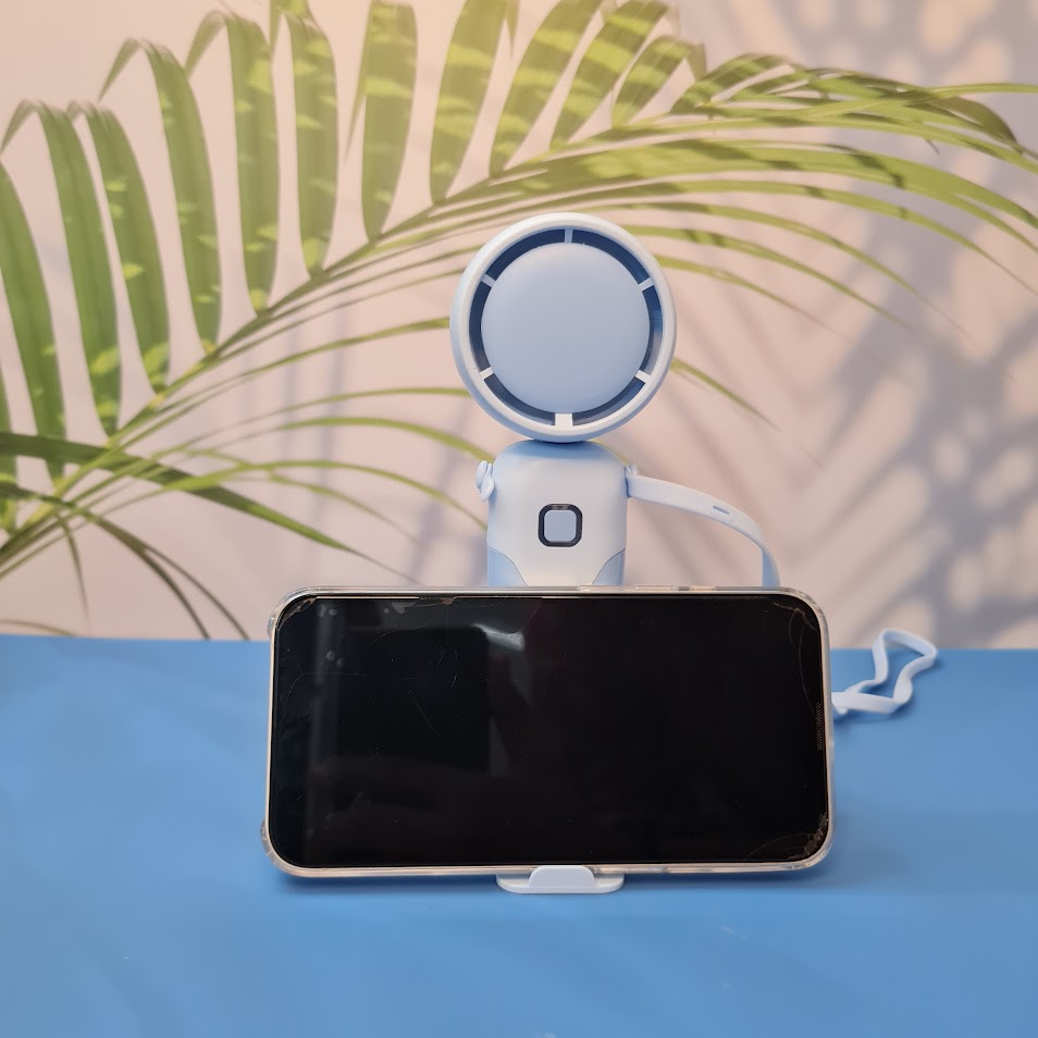 Colorful collection of portable bladeless mini fans for kids in pastel pink, green, blue with bear ears, and cream, designed with a child-safe bladeless head and single-button operation. These rechargeable USB fans are ideal for travel, school desks, or bedtime comfort, offering quiet and efficient cooling in a cute, compact design. Perfect return gift or utility item for children, available at U Smile Toys online store