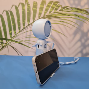 Colorful collection of portable bladeless mini fans for kids in pastel pink, green, blue with bear ears, and cream, designed with a child-safe bladeless head and single-button operation. These rechargeable USB fans are ideal for travel, school desks, or bedtime comfort, offering quiet and efficient cooling in a cute, compact design. Perfect return gift or utility item for children, available at U Smile Toys online store