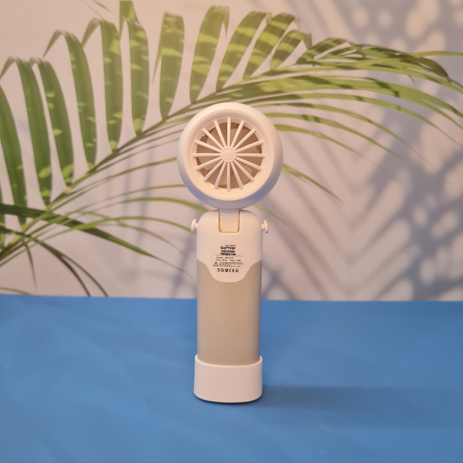 Colorful collection of portable bladeless mini fans for kids in pastel pink, green, blue with bear ears, and cream, designed with a child-safe bladeless head and single-button operation. These rechargeable USB fans are ideal for travel, school desks, or bedtime comfort, offering quiet and efficient cooling in a cute, compact design. Perfect return gift or utility item for children, available at U Smile Toys online store