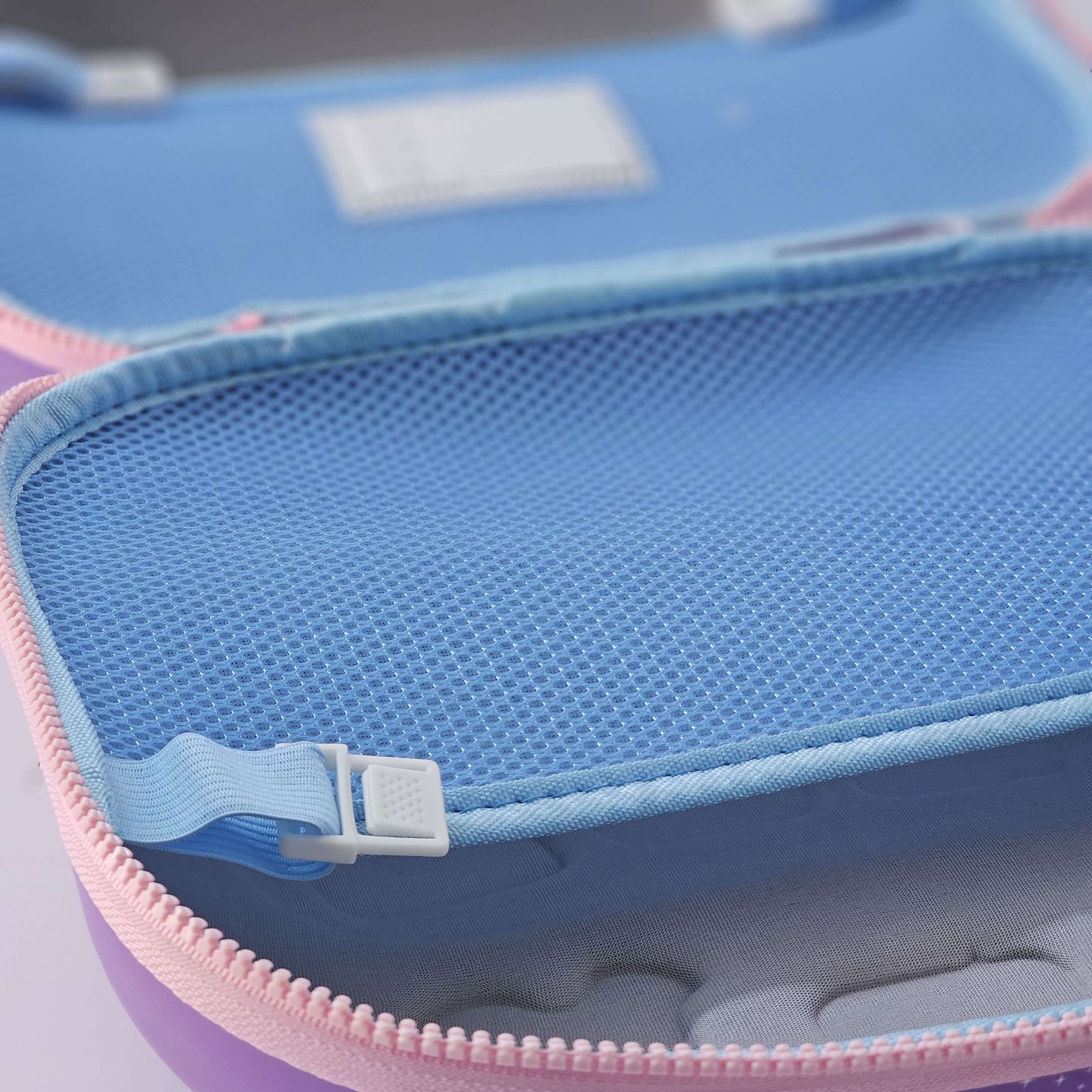 Close-up of a blue and pink rectangular pouch with a zipper.