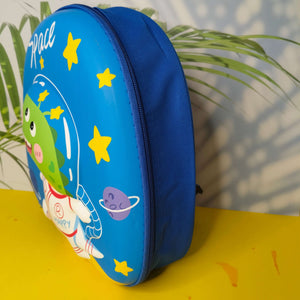 Blue round pouch with cartoon design on a yellow surface