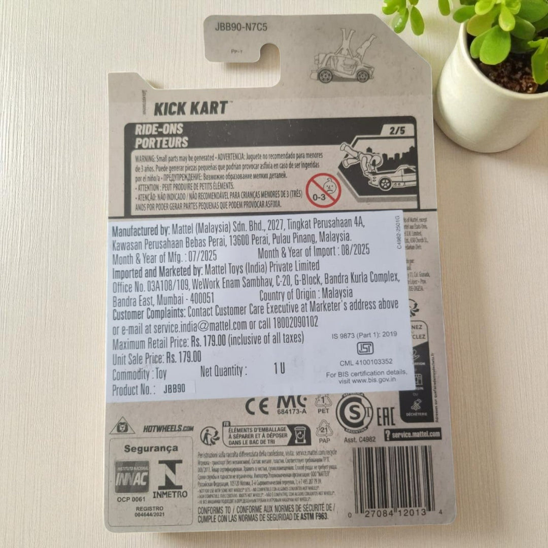 Back of a toy packaging with branding and product details on a light surface.