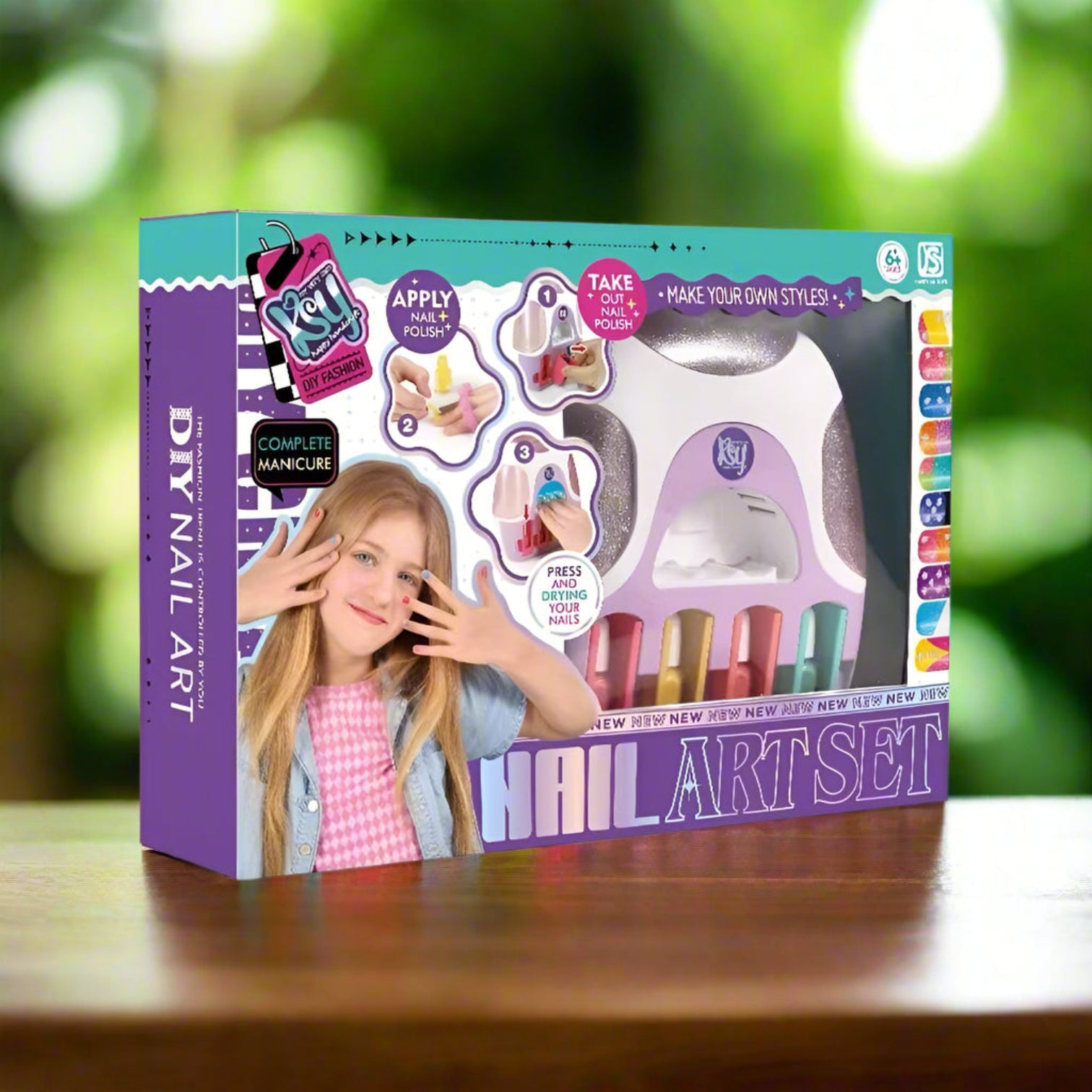 Colorful box for a Kids Nail Art Set by Usmile Toys, featuring a young girl, nail polish bottles, and a manicure tablet for DIY nail design.
