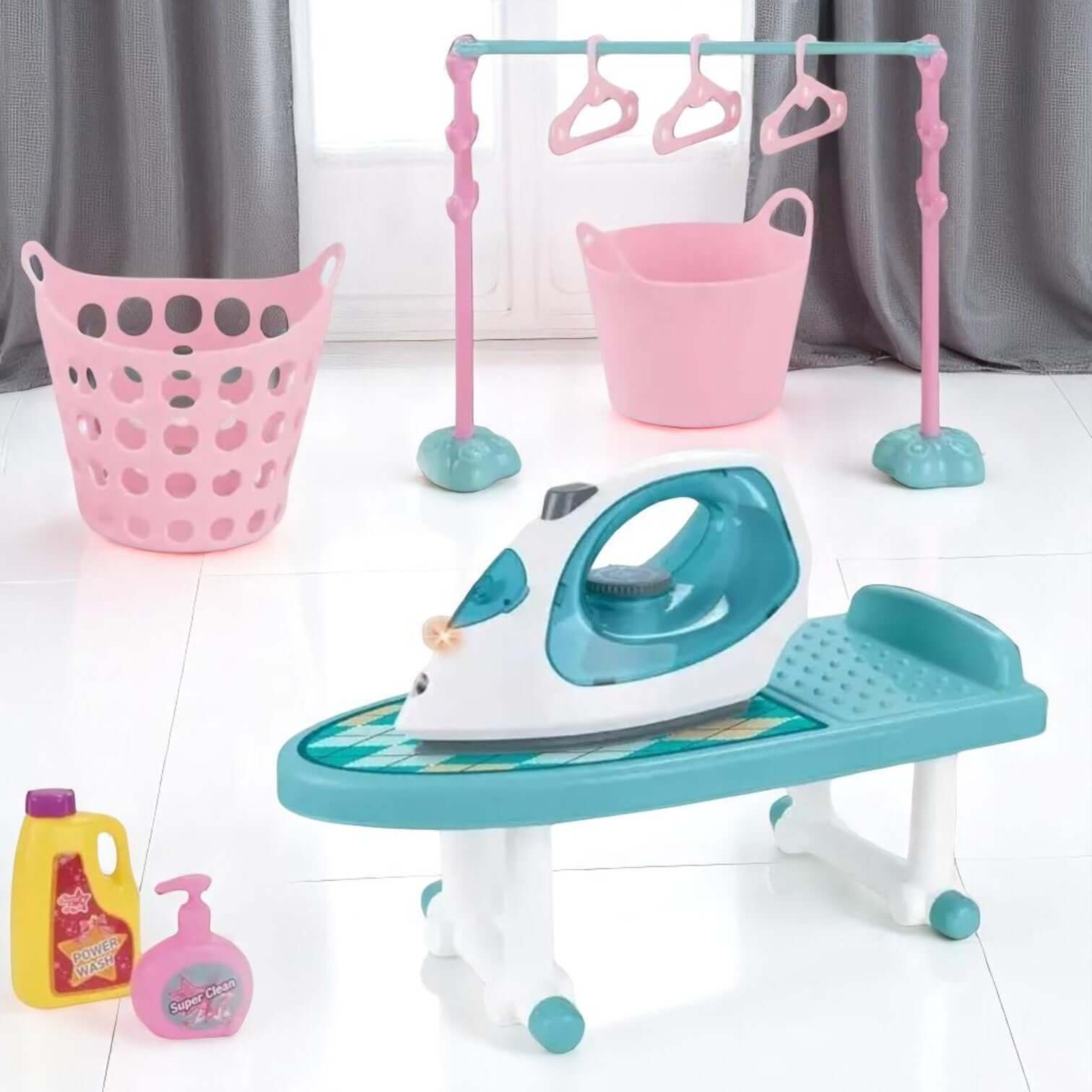Complete kids pretend play iron set in pink and teal, featuring a toy iron, ironing board, laundry basket, clothes rack, hangers, and detergent bottles, perfect for imaginative play from Usmile Toys www.usmile.toys