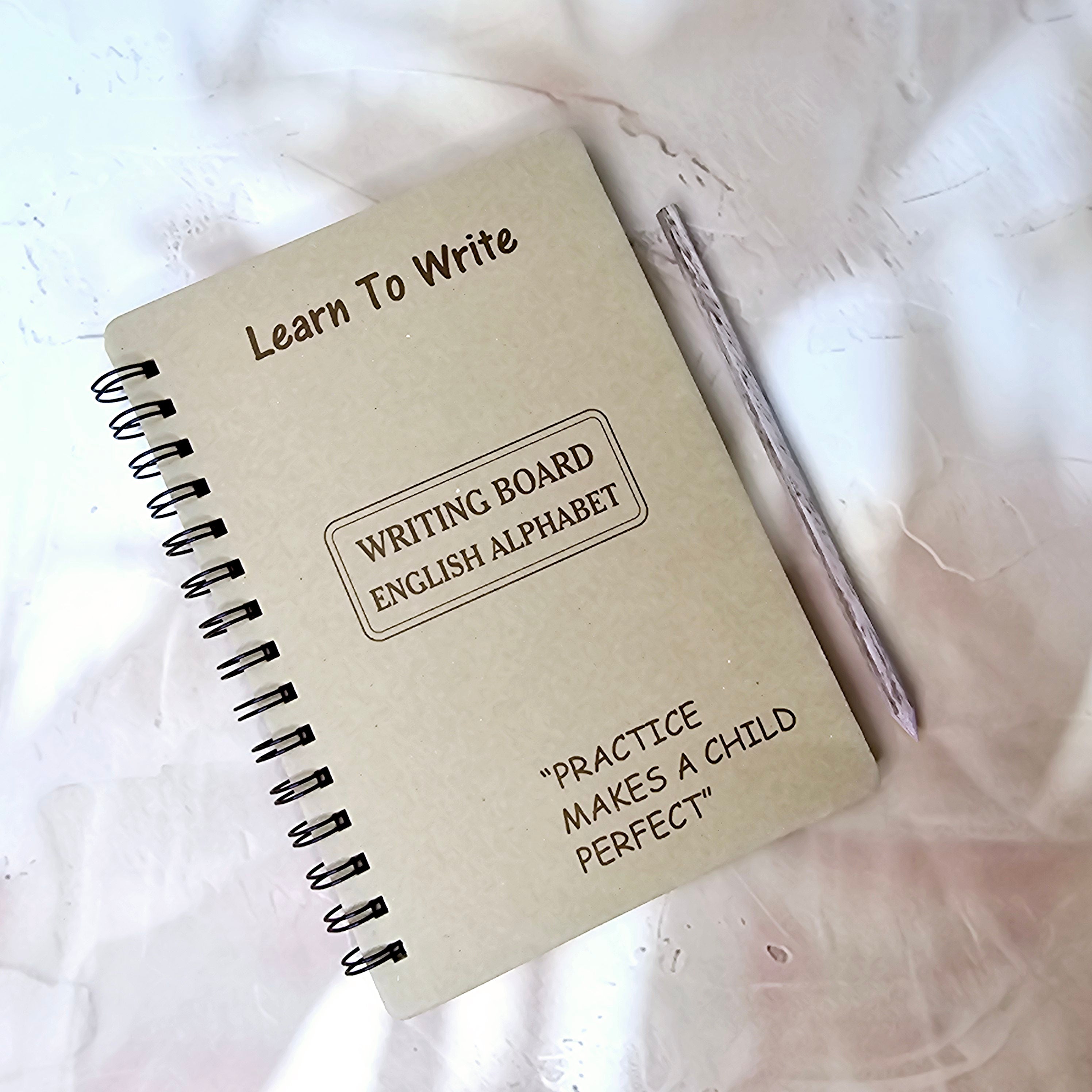 Learn to Write English Alphabet tracing board for kids with "Practice Makes a Child Perfect" motto and stylus. www.usmile.toys