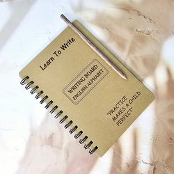 Educational writing activity set for kids, featuring a spiral-bound English alphabet tracing board and wooden stylus. www.usmile.toys