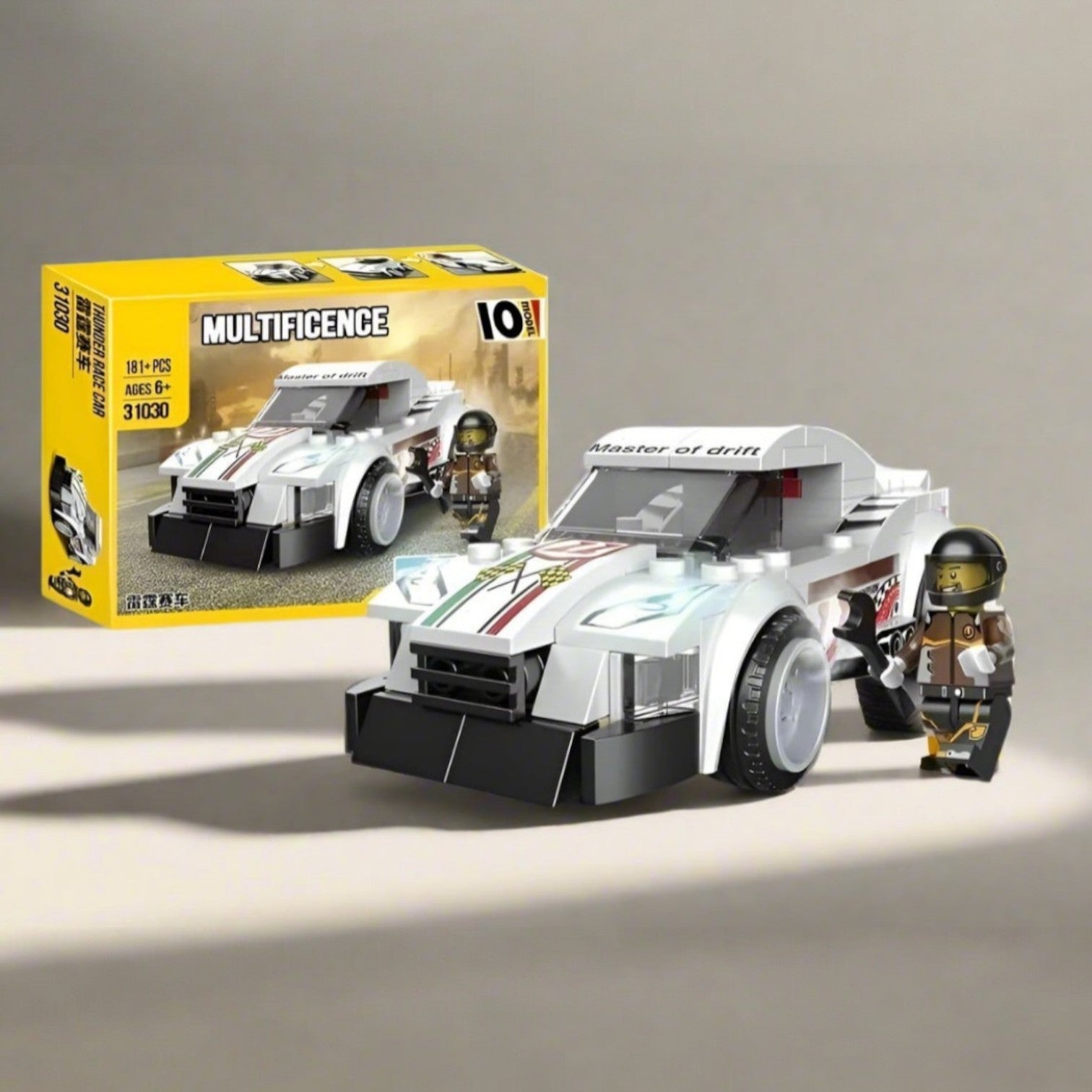 White and black "Multificence" racing car model building blocks set (181 pieces, Ages 6+), forming a sports car with a driver minifigure. Ideal learning kit for kids and aspiring builders from usmile.toys. www.usmile.toys