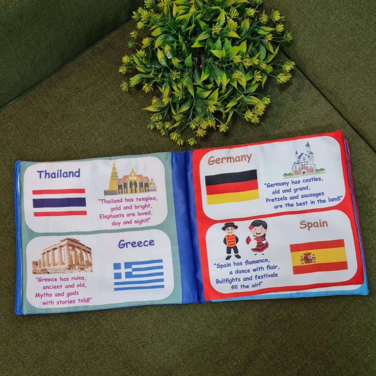 "Flag of the World" fabric book by Kidogen, displaying pages about India, USA, Italy, and the United Kingdom with their flags, landmarks, and descriptive rhymes.