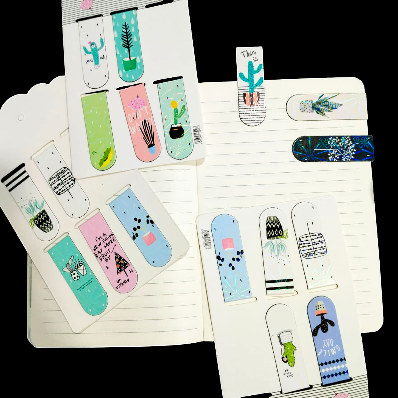 Set of colorful bookmarks with plant designs on a notebook
