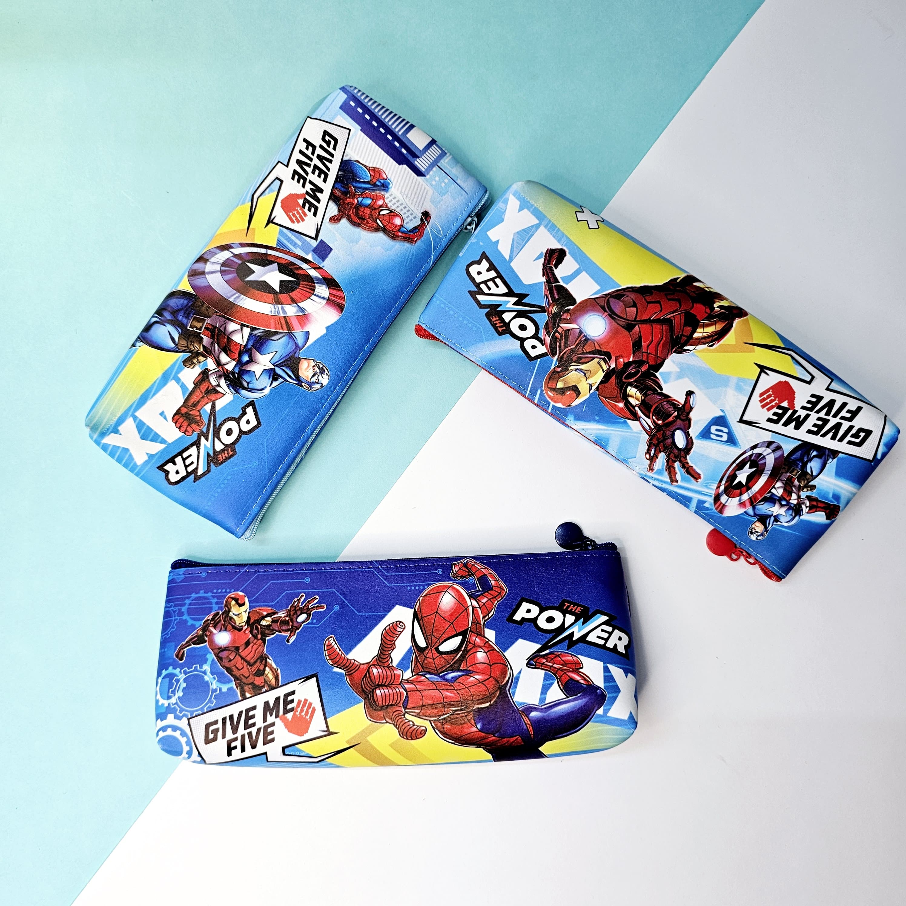 Return gift: Three Marvel Avengers single chain pencil pouches featuring Iron Man, Captain America, and Spider-Man designs from www.usmile.toys