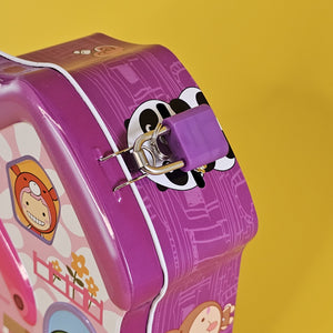 Kids' metal coin banks with locks, house shaped, in green, purple, and blue. www.usmile.toys