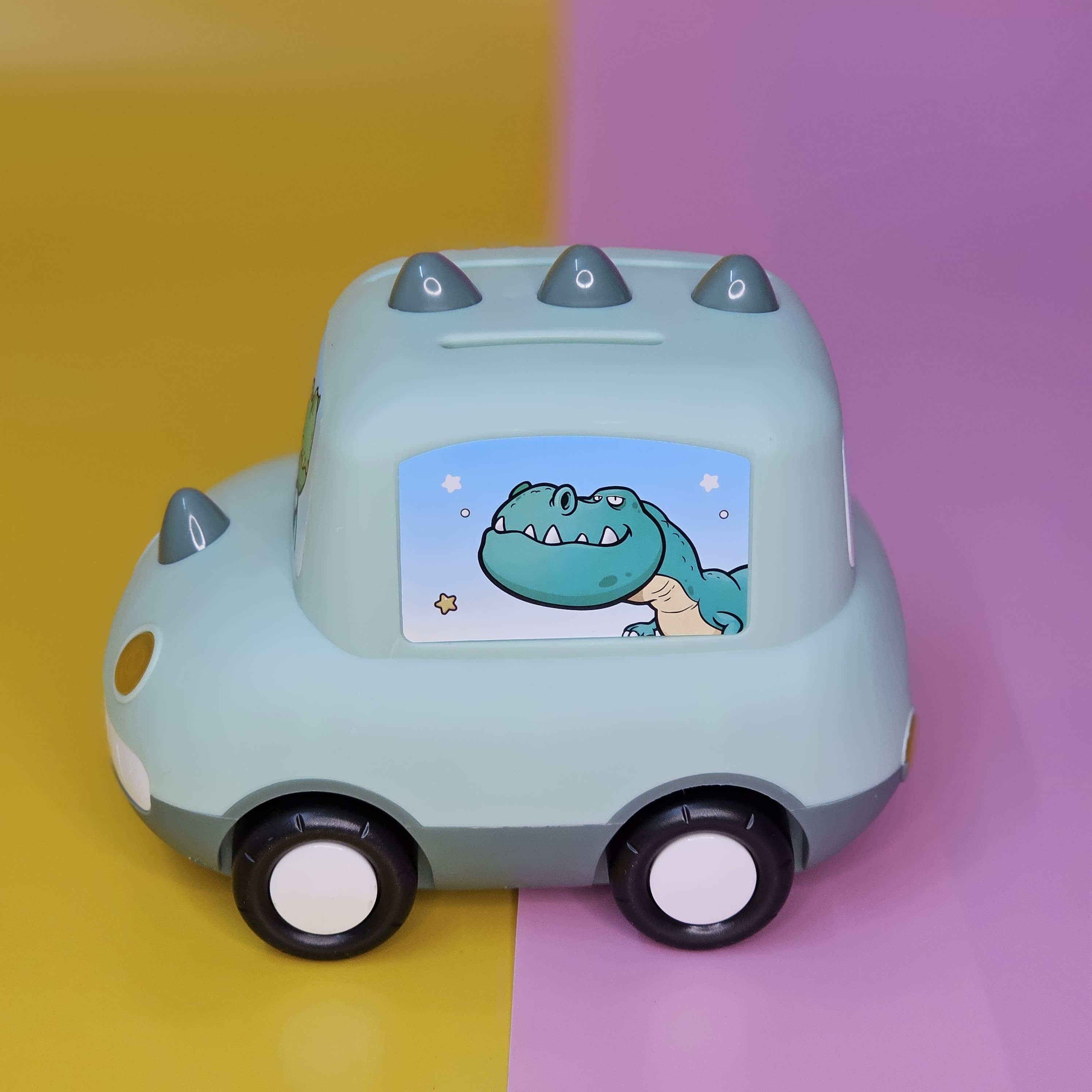 Cute Car-Shaped Metal Money Box for Kids – Fun & Secure Piggy Bank with Lock & Key | Adorable Cartoon Dino & Bunny Designs | Perfect Return Gift for Birthdays, Parties & Special Occasions | Durable & Stylish Savings Box | Available at www.usmile.toys