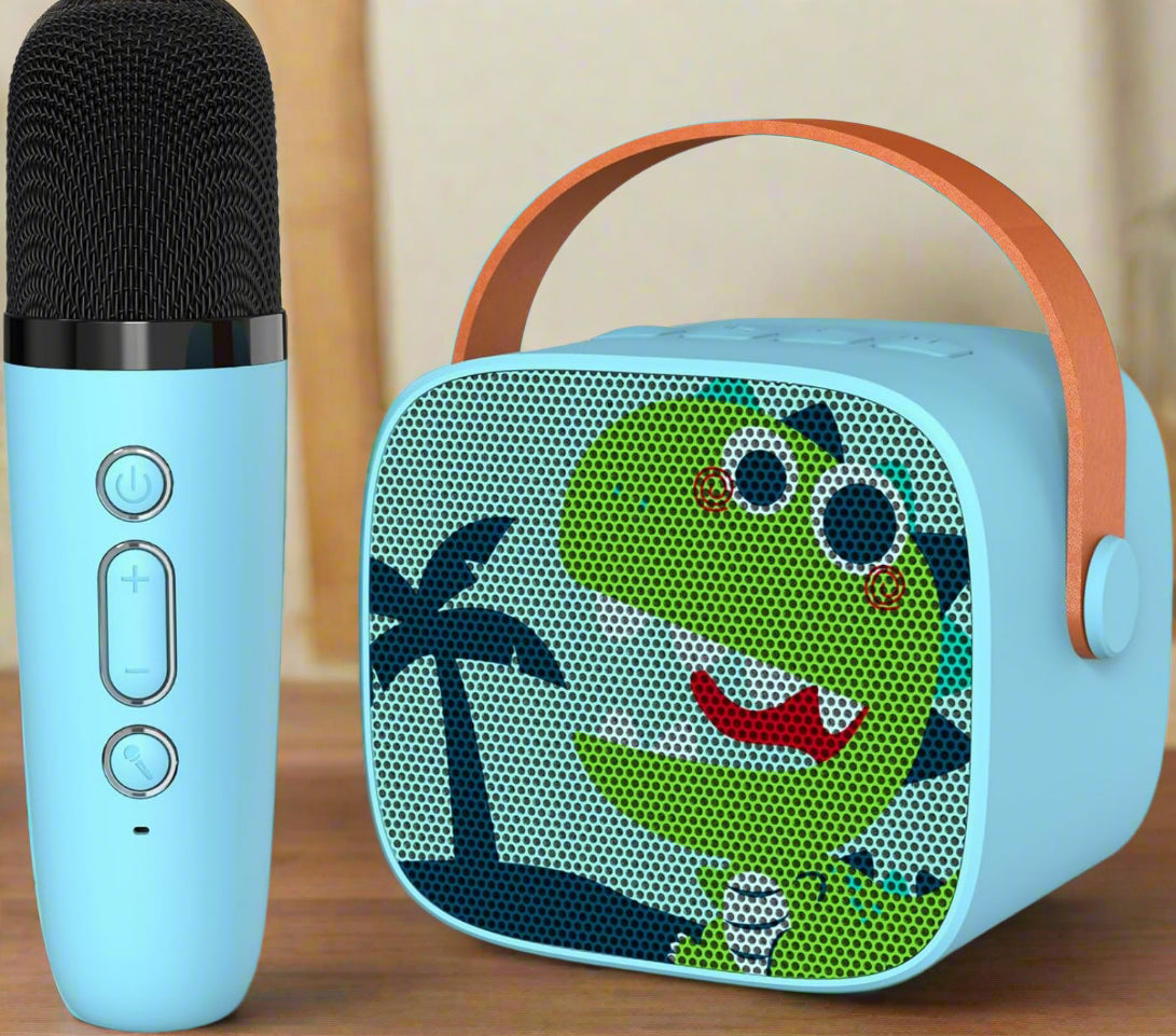 Cute blue mini karaoke portable Bluetooth speaker with a smiling green dinosaur design, paired with a matching wireless microphone for kids, by Usmile Toys." www.usmile.toys