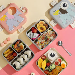 Leakproof stainless steel lunch box with a charming elephant design and multiple compartments, ideal for organized meal storage for children and adults .
www.usmile.toys
