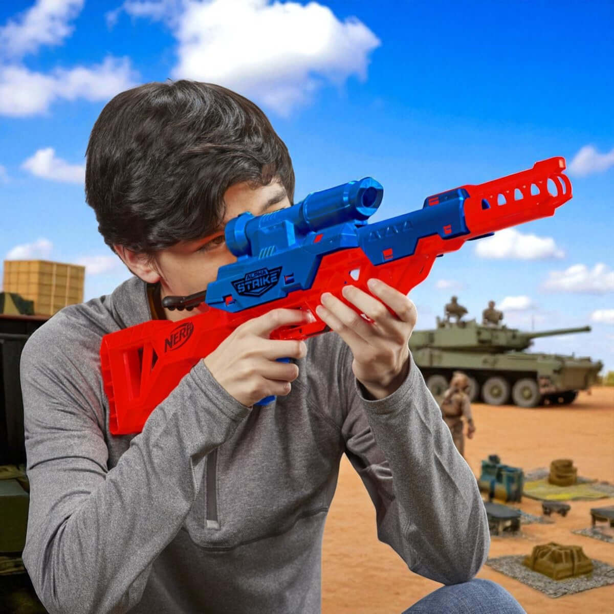 Person holding a red and blue Nerf gun with military-themed background