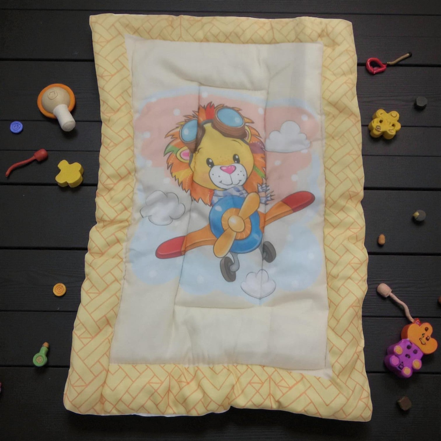 "Variety pack of five handmade baby godadi (quilts) with colorful cartoon prints including animals, rabbits, and a cow, ideal for newborns and tummy time." www.usmile.toys