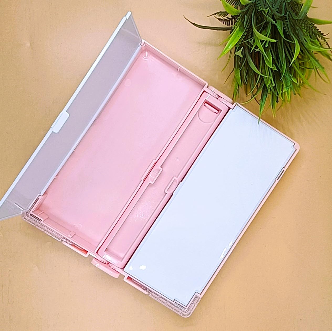 Kids' pencil case with a book stand, showcasing an 'Iron Warrior' robot design www.usmile.toys