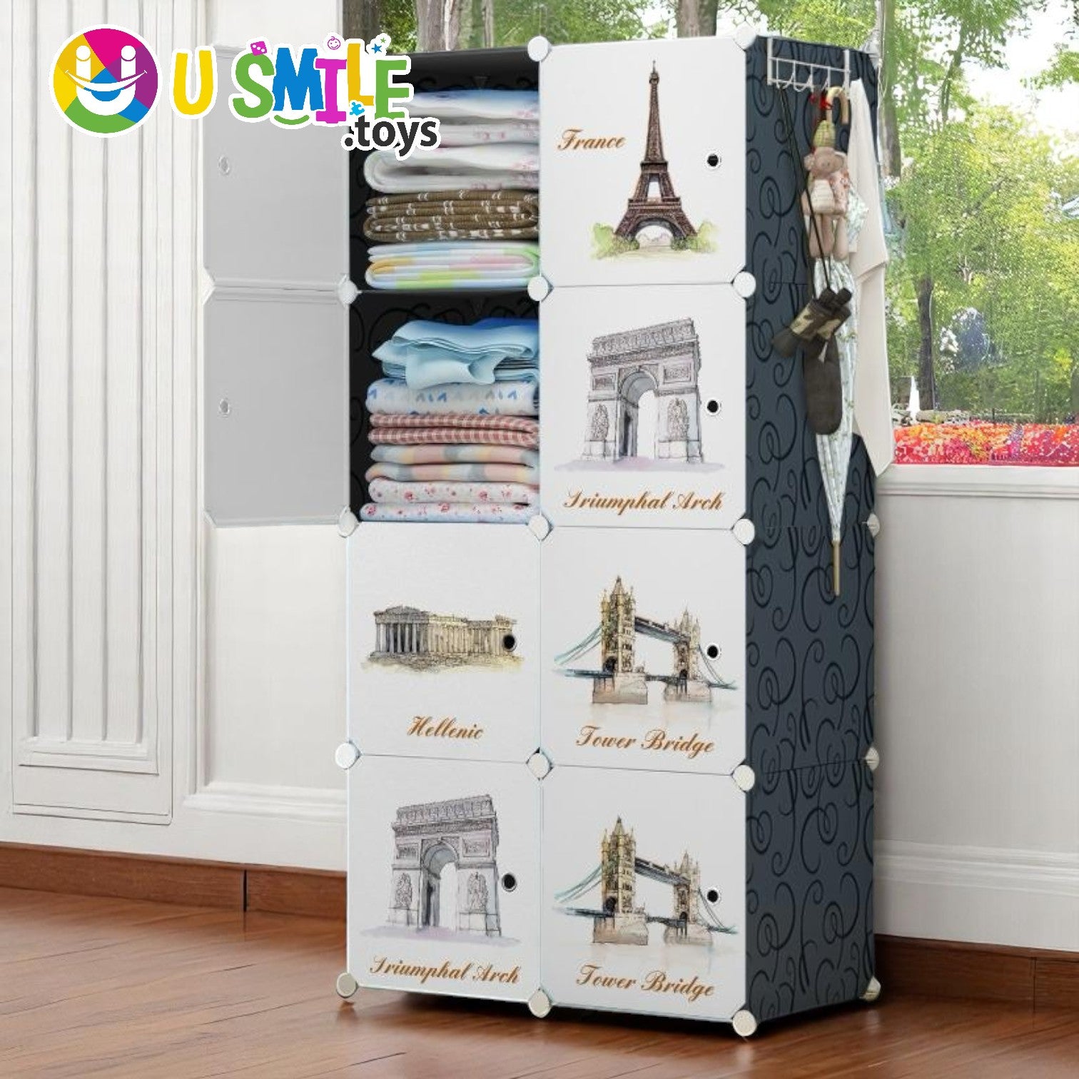 White and black plastic baby wardrobe collapsible storage rack with 8 cubes, featuring famous world monument designs like Eiffel Tower and Tower Bridge. www.usmile.toys