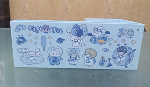 Cartoon character-themed product packaging on a reflective surface with a wooden background