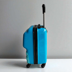 Uses alternative keywords like "rolling luggage" and "two-tone," and adds a playful element ("travel adventures") that aligns with a toy website. www.usmile.toys