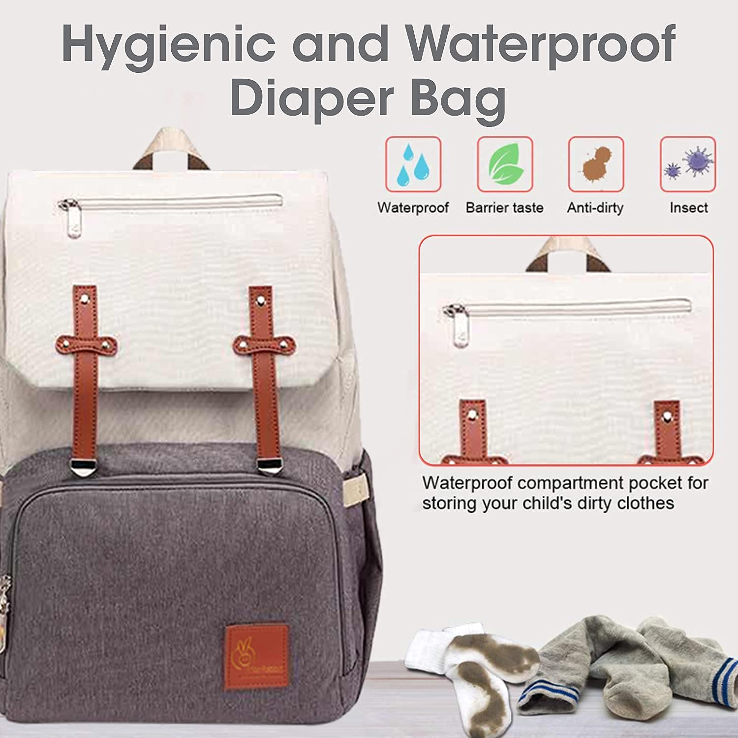 Gray diaper bag with brown straps and a white top section, featuring text about its hygienic and waterproof properties.
