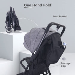 Stroller with one-hand fold feature and push button on a gray background