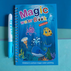Children's magic water book with underwater illustrations and a marker on a blue background