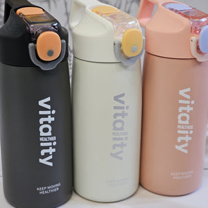 Stainless steel water bottles for kids and adults, featuring double-walled insulation, flip-top lids, and 'keep moving healthier www.usmile.toys
