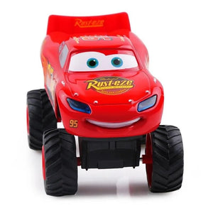 Toy car with a red body and black wheels on a white background