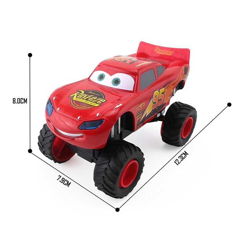 Red toy monster truck with character face, measurements on a white background