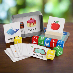 Montessori-inspired wooden spelling game set for kids with precise measurements – includes illustrated word flashcards (7.8cm x 6.9cm), colorful rotating alphabet blocks (2.5cm each), wooden card holder (6.8cm x 3.4cm x 2cm), and a durable metal storage box (12.5cm x 9.5cm x 4cm). A fun and engaging early learning toy for preschoolers to improve spelling, letter recognition, and word formation. Perfect educational gift for children ages 3 and up – available at U Smile Toys India