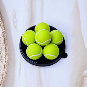 mini sports ball erasers for kids, including green tennis, black and white soccer, and blue/yellow volleyball designs. www.usmile.toys