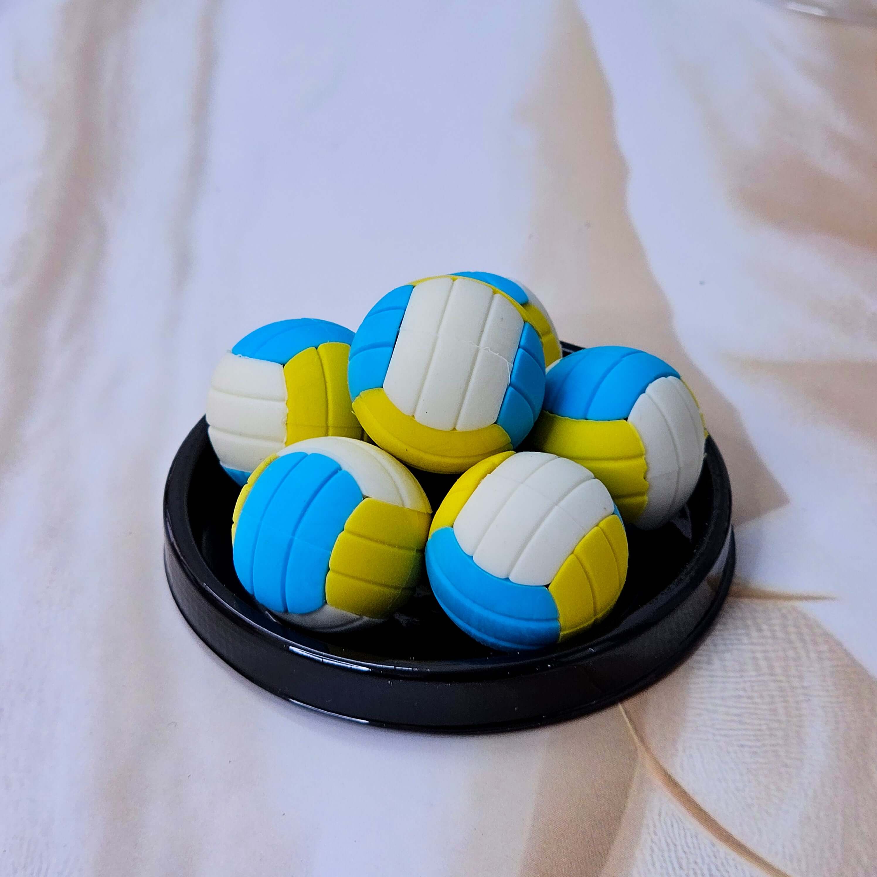 Collectible sports themed erasers for children, a set of six in tennis, soccer, and volleyball shapes. www.usmile.toys