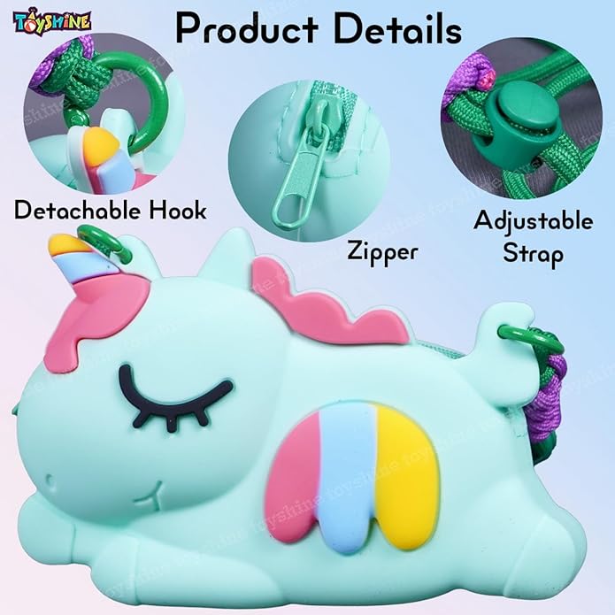 Close-up of a light blue unicorn-shaped silicone cross-body purse with rainbow stripe detail, matching unicorn comb, keychain, and circular mirror. Ideal stylish bag for girls from uSmile.toys." www.usmile,.toys