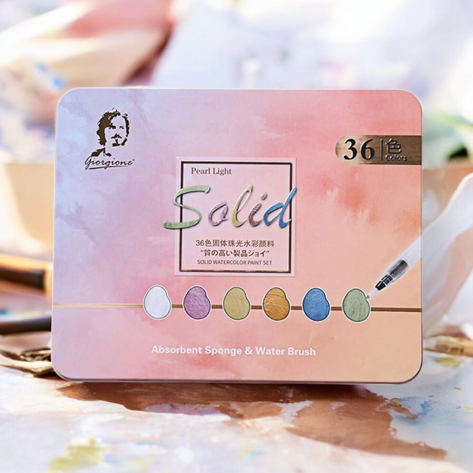 "Usmile Toys Giorgione 36-color solid watercolor paint set in a rectangular tin, featuring 'Pearl Light' colors and including an absorbent sponge and water brush." www.usmile.toys