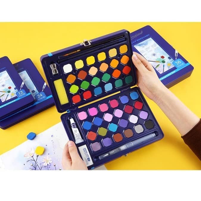 Open blue metal case revealing a watercolor paint set of 48 vibrant hexagonal shades across two layers, including a water brush, pencil, sharpener, and white paint tube. Perfect for artists and kids from uSmile.toys." www.usmile.toys www.usmile.toys