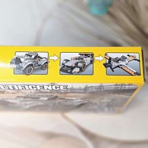 Front of the product packaging for a building block toy set, showing a constructed gray jeep-like vehicle and a character figure against a desert road background, promoting imaginative play from Usmile Toys.www.usmile.toys