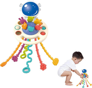 Happy Baby" silicone sensory Pull String Toy in a space theme, featuring an astronaut helmet, colorful pull cords, and press/push buttons for toddlers' fine motor skill development, with packaging. www.usmile.toys