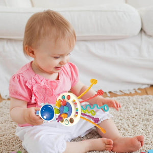 Educational space-themed sensory toy designed to enhance fine motor skills and sensory exploration for infants and toddlers. www.usmile.toys