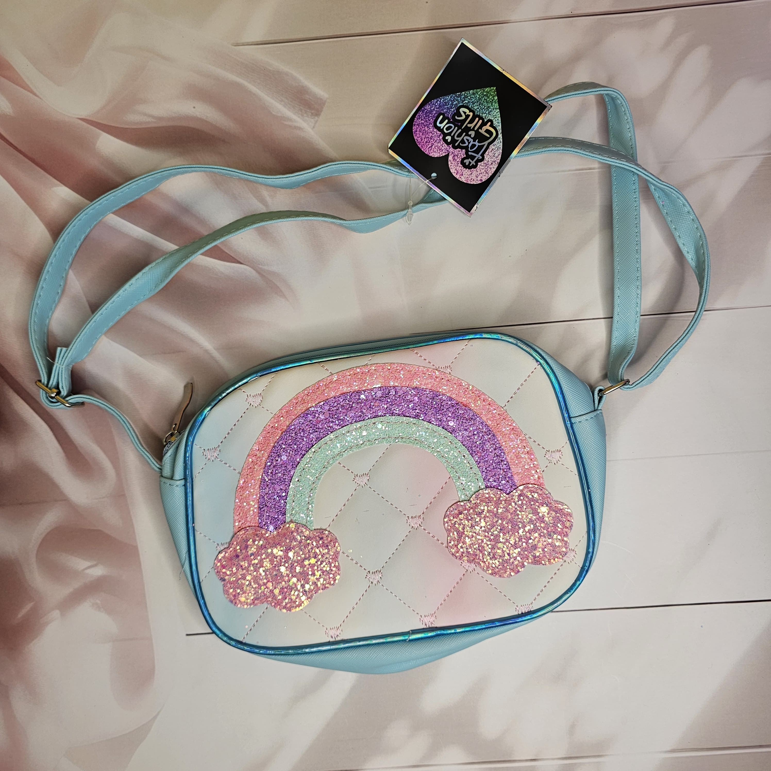 Shop this fashionable and sparkly kids' crossbody bag and more at Usmile Toys www.usmile.toys.
